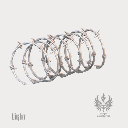 Barbed wire coils